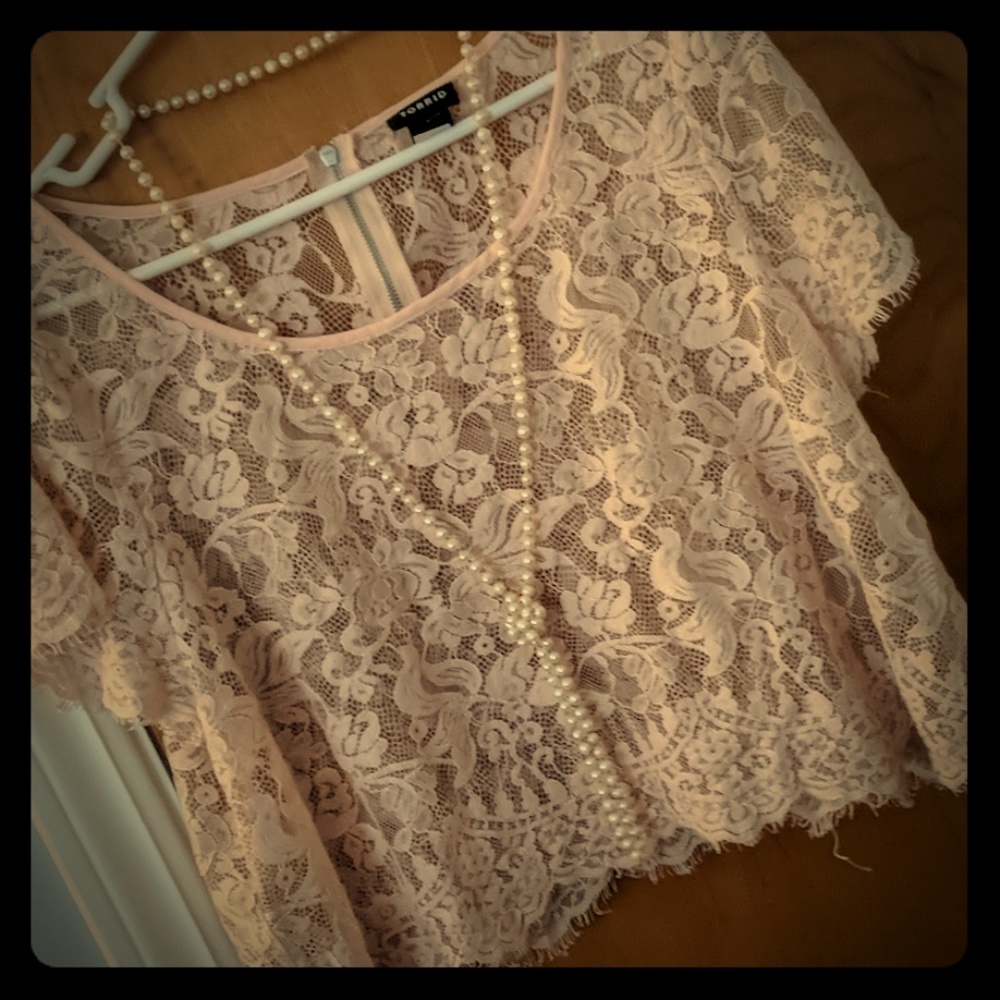 Pink lace crop top. Torrid size 0 which is a large